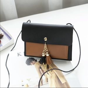 Brown and black satchel